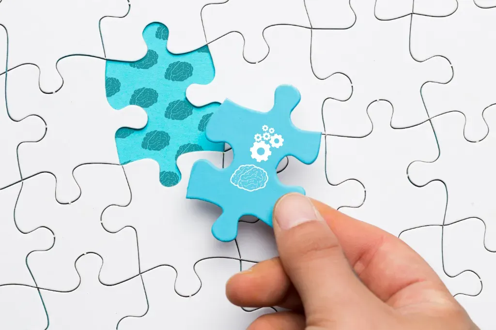 niebieski puzzel z ilustracją mózgu